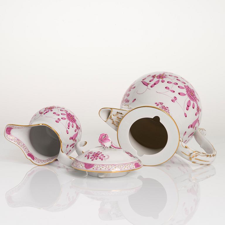 A 77-piece set of Meissen 'Indische malerei' porcelain tableware from the latter half of the 20th century.