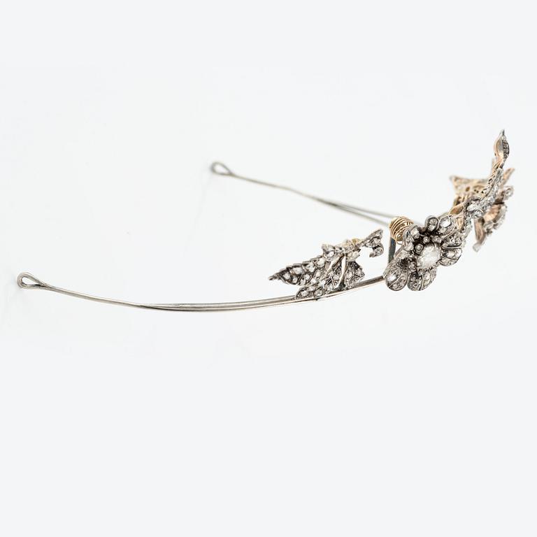 A silver and gold tiara with old-cut and rose-cut diamonds.