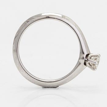 Tiffany & Co, a platinum ring with a brilliant-cut diamond 0.24 ct. With certificate.