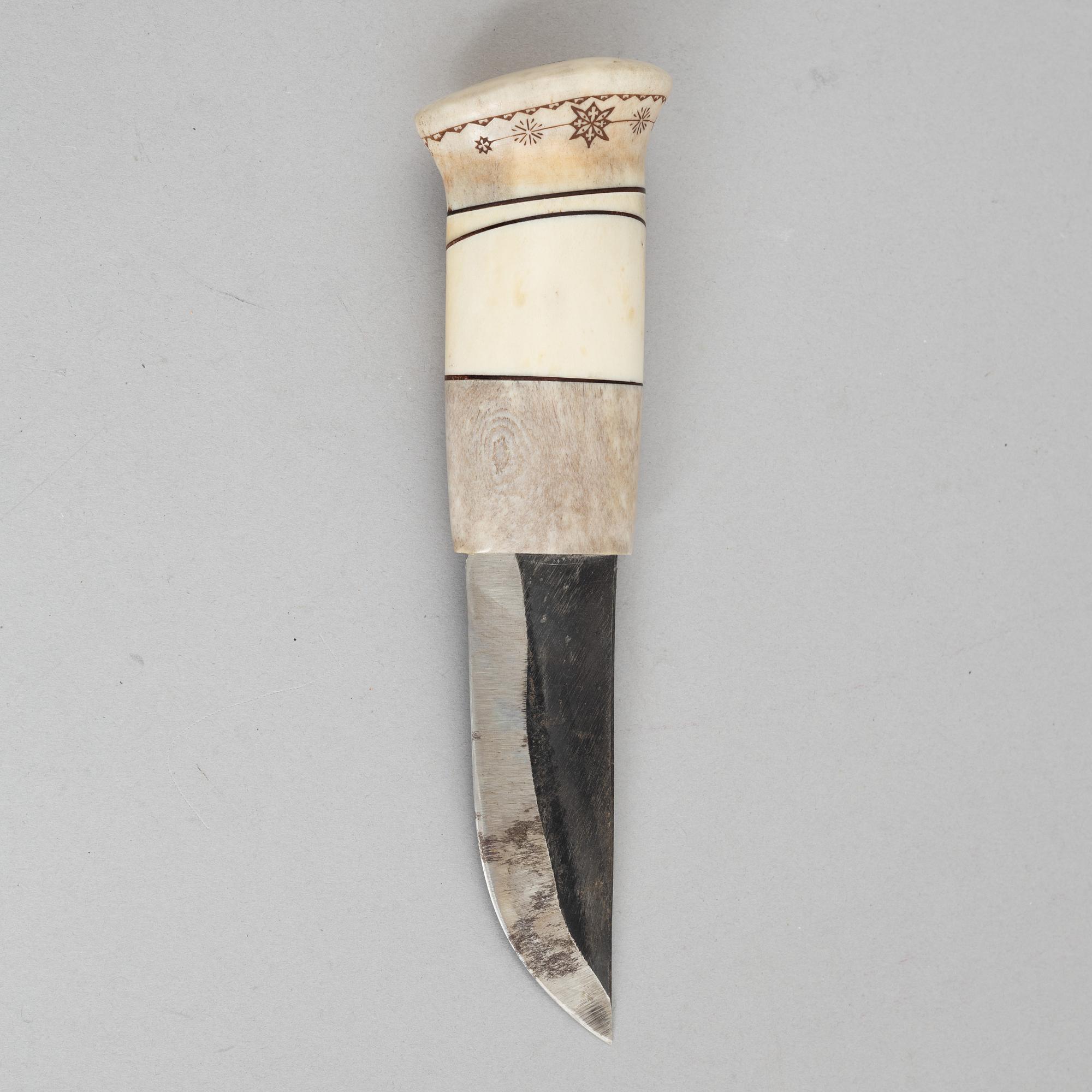 A knife, signed and dated 1992.