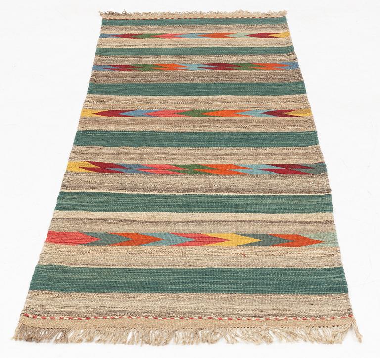 A Kilim runner, c. 213 x 74 cm.