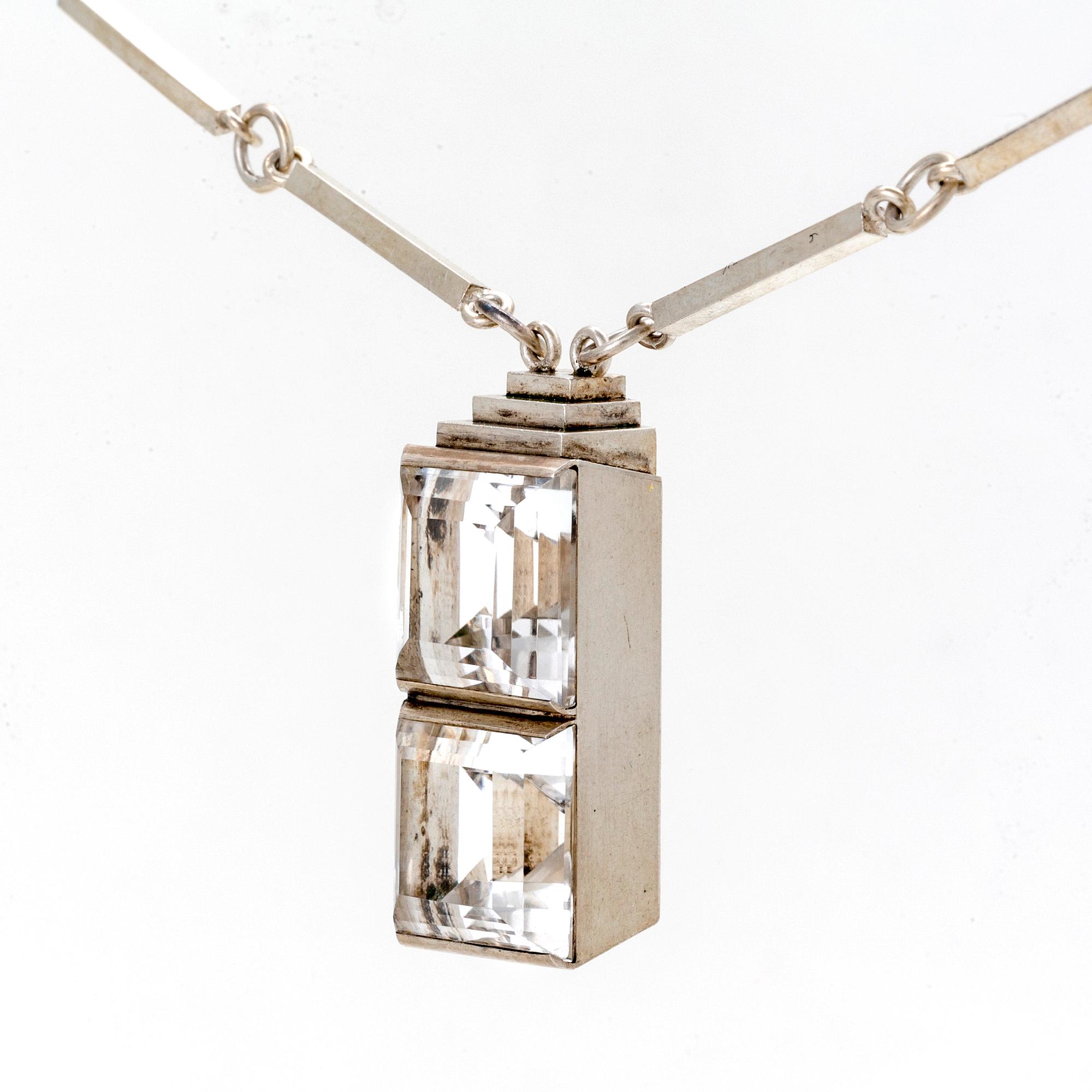 Wiwen Nilsson, pendant on chain, sterling silver, two rock crystal sapprox 15 x 15 mm each, Lund 1945.