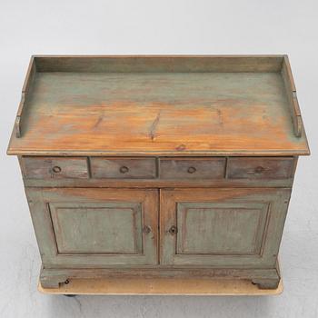 A 19th century sideboard.