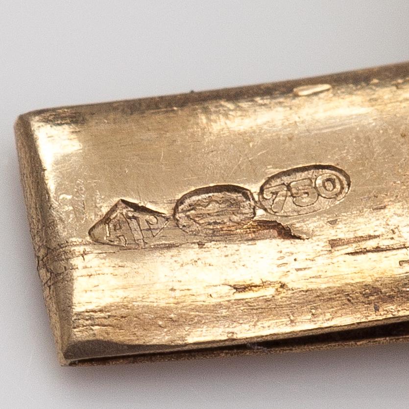 An 18K gold bracelet. Import markde Tillander, Helsinki.