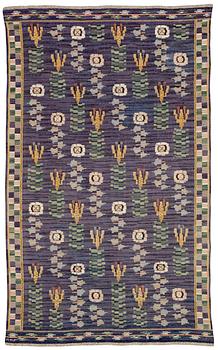 892. DRAPERI.  "Rosor och liljor". Rölakan. 254 x 155,5 cm. Signerat MMF (Märta Måås-Fjetterström).
