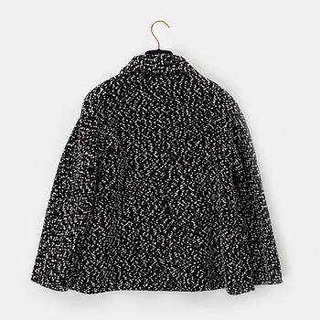 Chanel, a wool bouclé jacket, size 34.