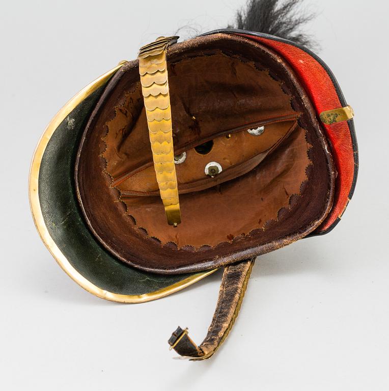 A Swedish military 
officer helmet m/1894.