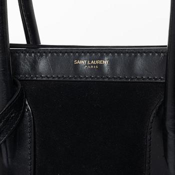 Yves Saint Laurent, a 'Sac du Jour' handbag.