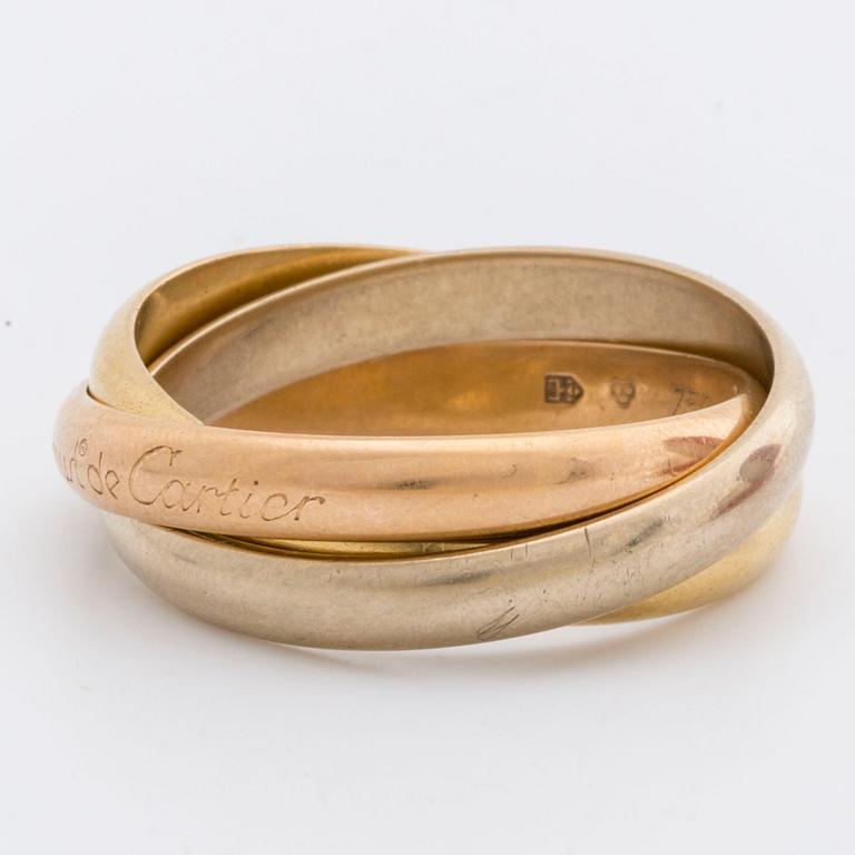 RING "Trinity" Must de Cartier, tri-coloured 18k gold, original case and certifikat.