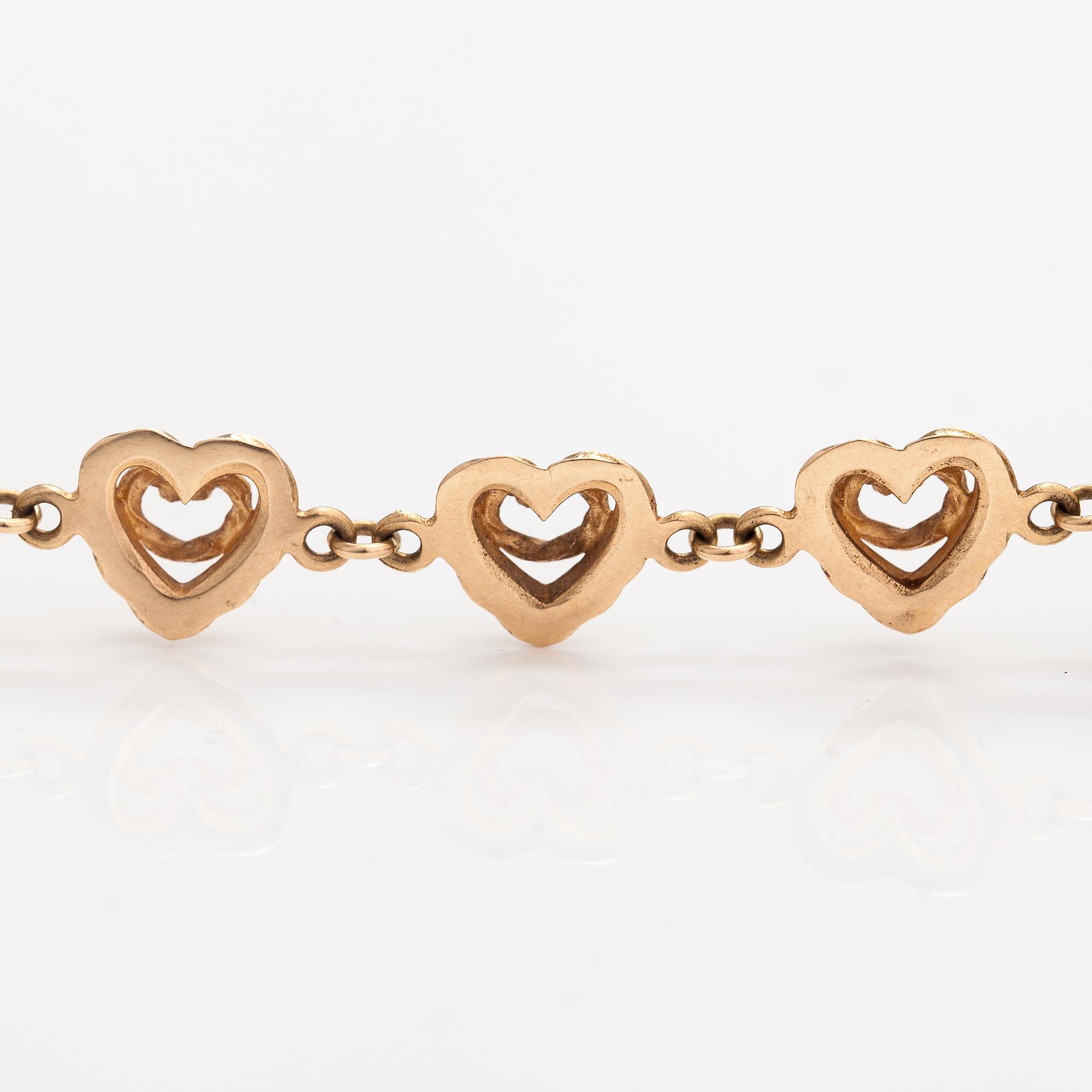 Tony Granholm, A 14K gold bracelet "Heart of the house". Kalevala koru, Helsinki 2002.