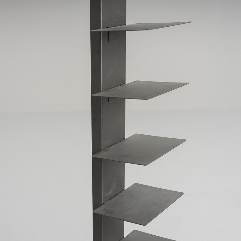 A grey lacquered metal shelf, contemporary production.