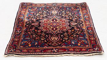 A Sarouk/Jozan rug, c. 86 x 64 cm.