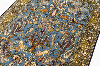 A Ghom figural rug, c. 202 x 132 cm.