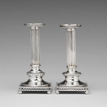 142. A pair of Swedish 18th century silver candlesticks, mark of Anders Castman ty, Eksjo 1798.