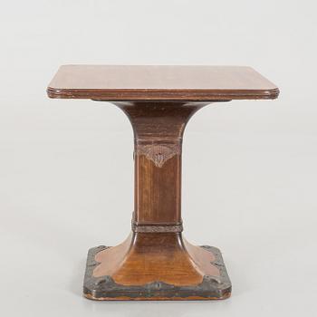 A mahogany veneered Art Nouveau table, early 20th century.