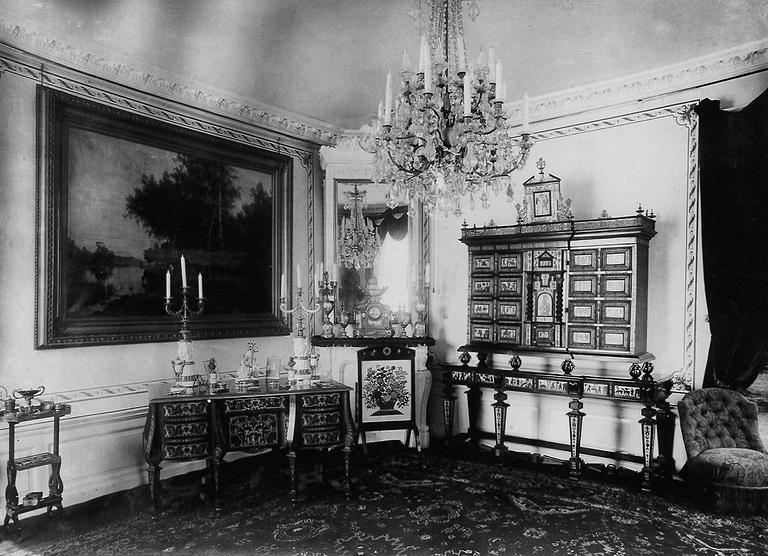 A 19th century Baroque-style free-standing writing table in the manner of Charles Boulle.