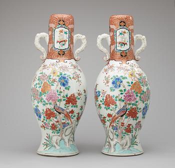 639. A pair of early 20th century large Japanese urns.