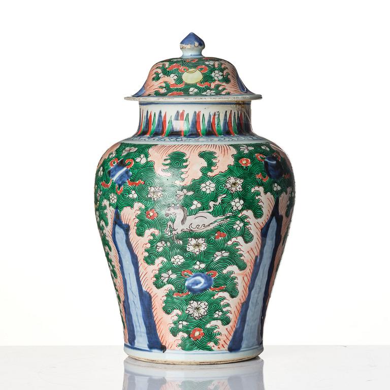 A Transitional wucai 'flying horse' baluster jar with cover, 17th century.