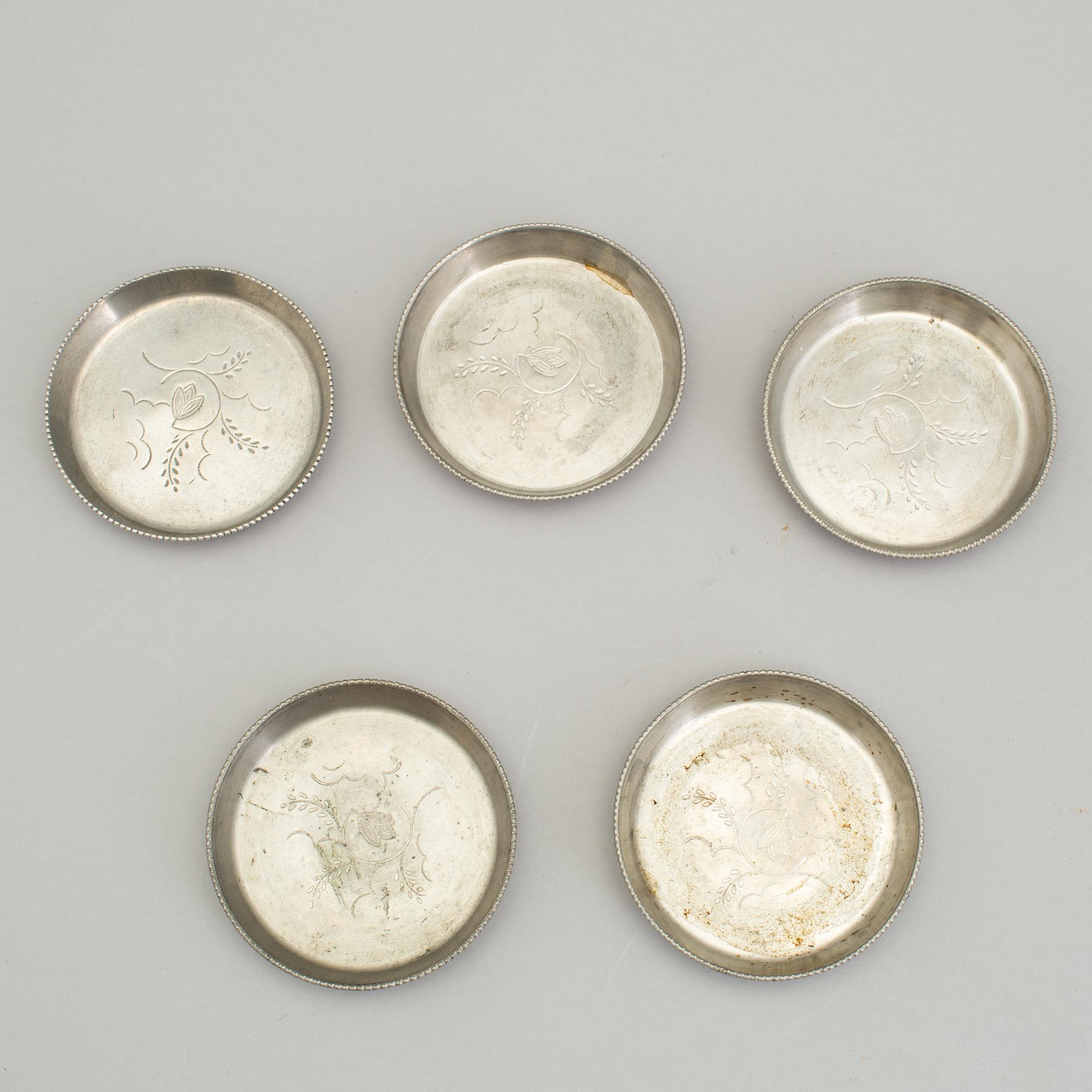 Five coasters, a vase, a bowl,  and an ashtray by Firma Svenskt Tenn first half of 20th centuty.