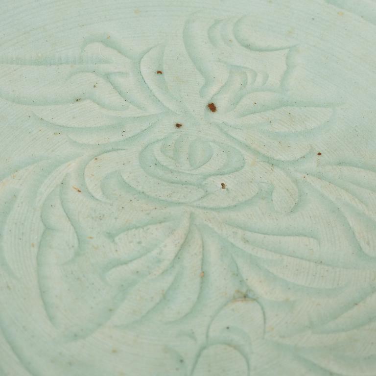 A Chinese celadon dish, Ming dynasty (1368-1644).