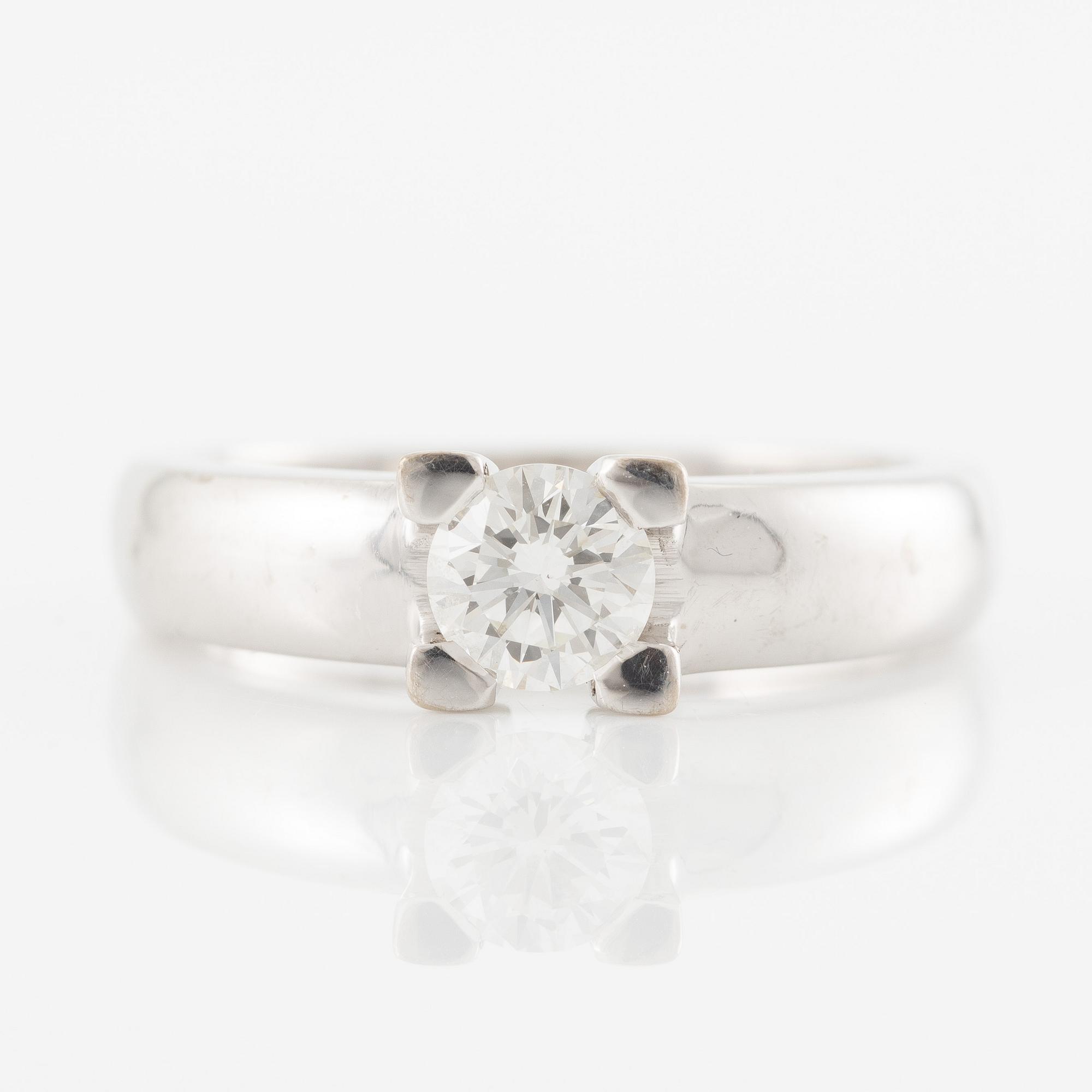 Ring in 18K white gold set with a brilliant-cut diamond weighing 0.49 ct according to the engraving.