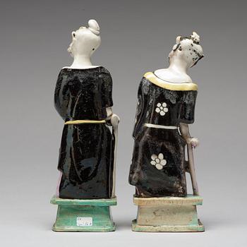 A pair of famille rose figures of 'Immortals', Qing dynasty, late 18th Century.