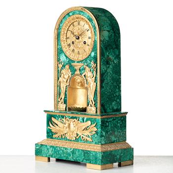 An Empire early 19th century mantel clock.