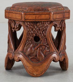 An Art Noveau sculptured pine stool probably by Knut Fjaestad, Sweden early 1900's.