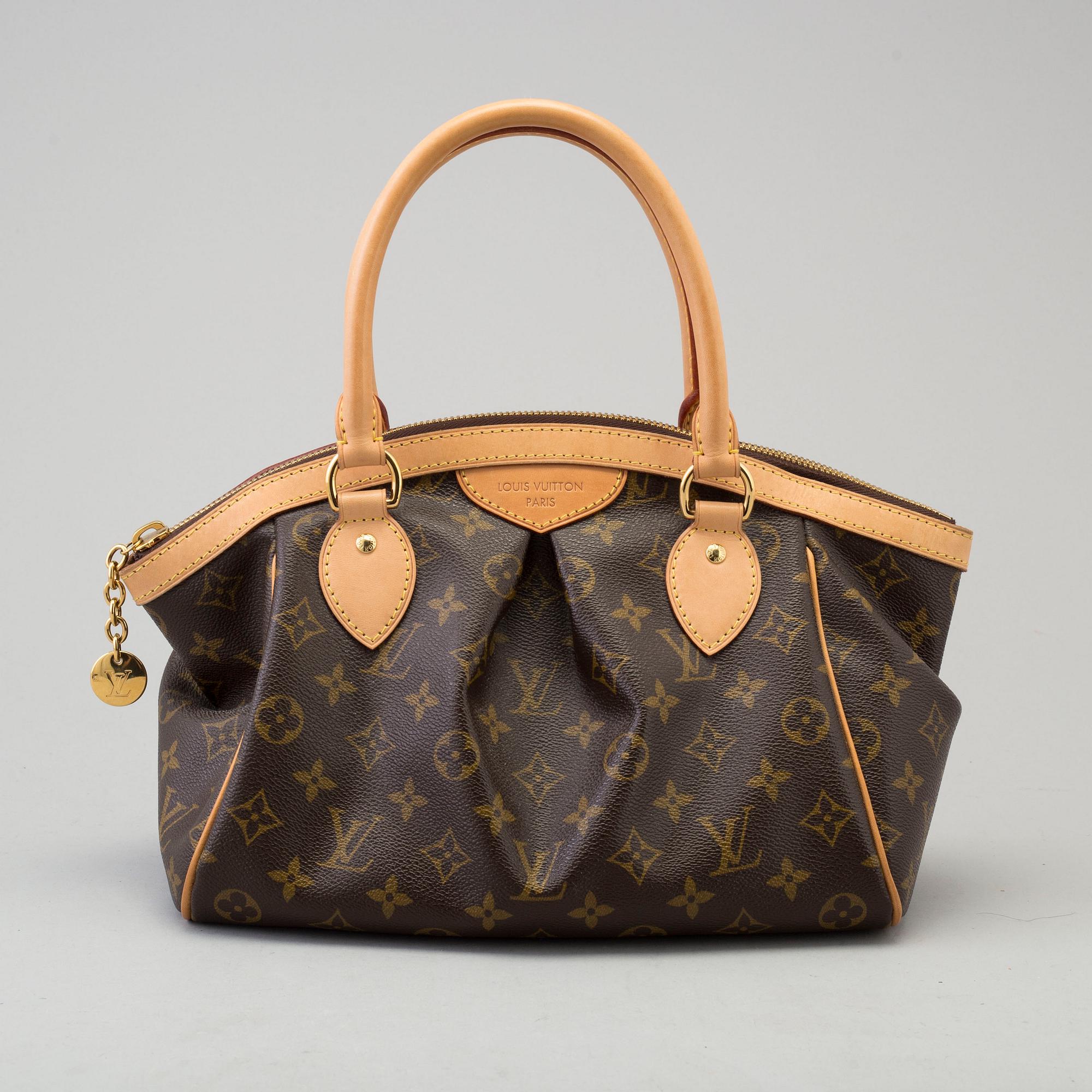 a LOUIS VUITTON 'Tivoli PM' bag.