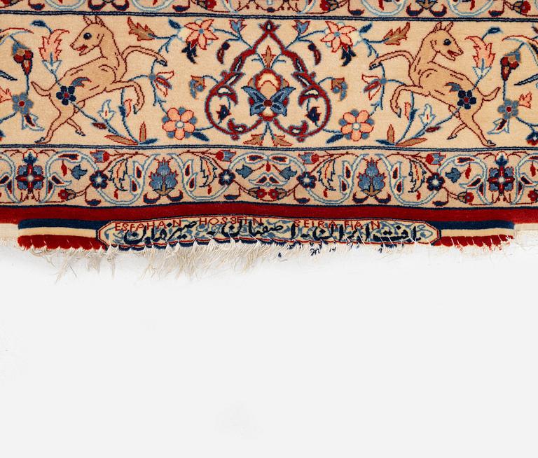 A semi-antique rug, Central Persia, signed (Hosien) Seirafian, c. 166 x 117 cm.