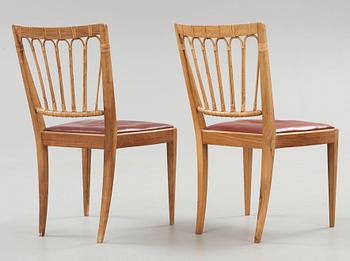 A pair of Josef Frank walnut and rattan chairs, Svenskt Tenn, model 1165.