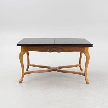 A Baroque style dining table , L.J. Larssons snickeriaffär, Mariefred, early 20th Century.