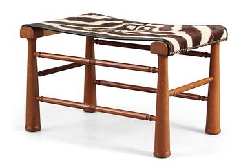 496. A Josef Frank mahogany stool, Svenskt Tenn, model 972.