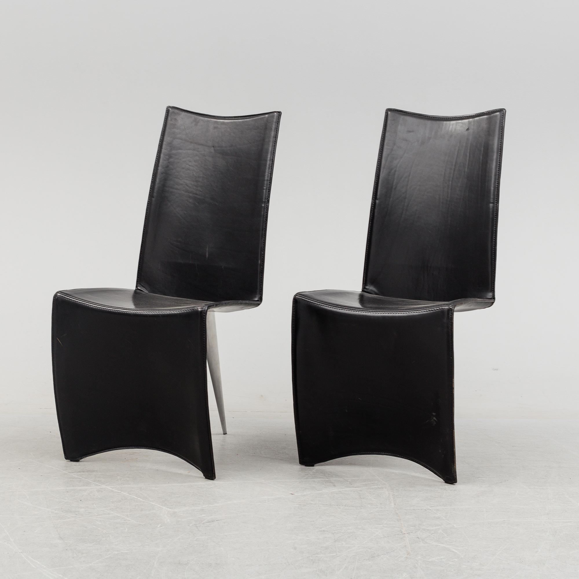 A Philippe Starck 'J Serie Lang' black leather and cast aluminium lounge chair, by Aleph, Italy.