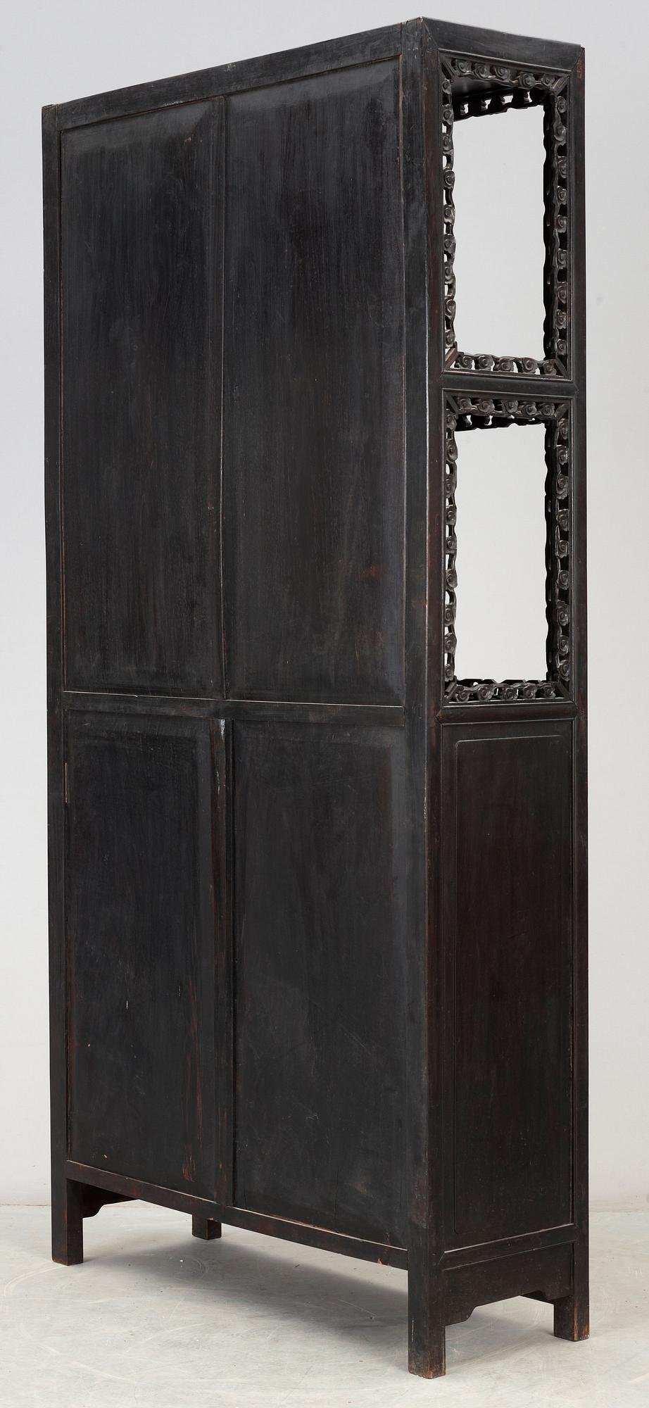 A Chinese hardwood cabinet, early 20th Century.