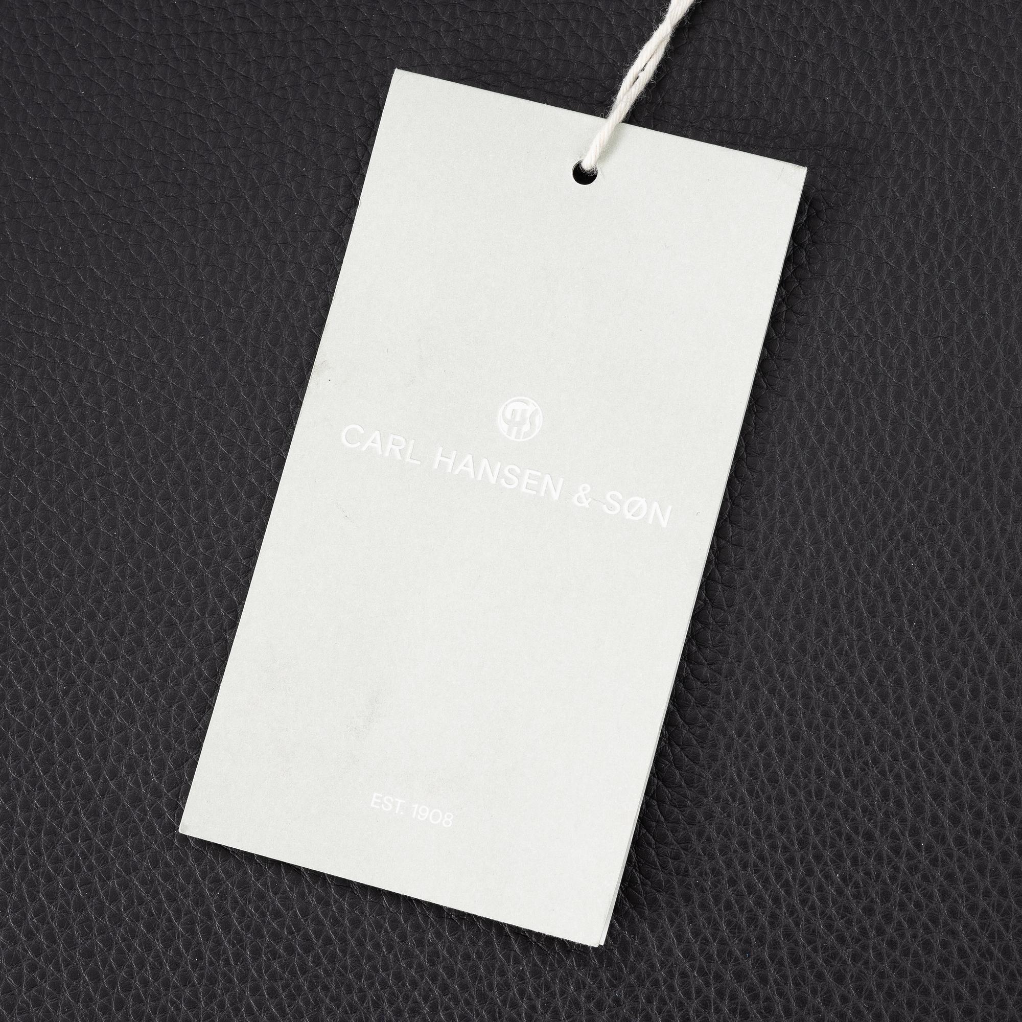 Hans J. Wegner, a set of three "CH-20" dining chairs, Carl Hansen & Son, Denmark 21st century.