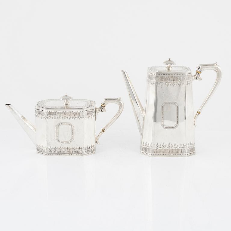 An English silver coffee-pot and a silver teapot, marks of Walter & John Barnard, London 1878.