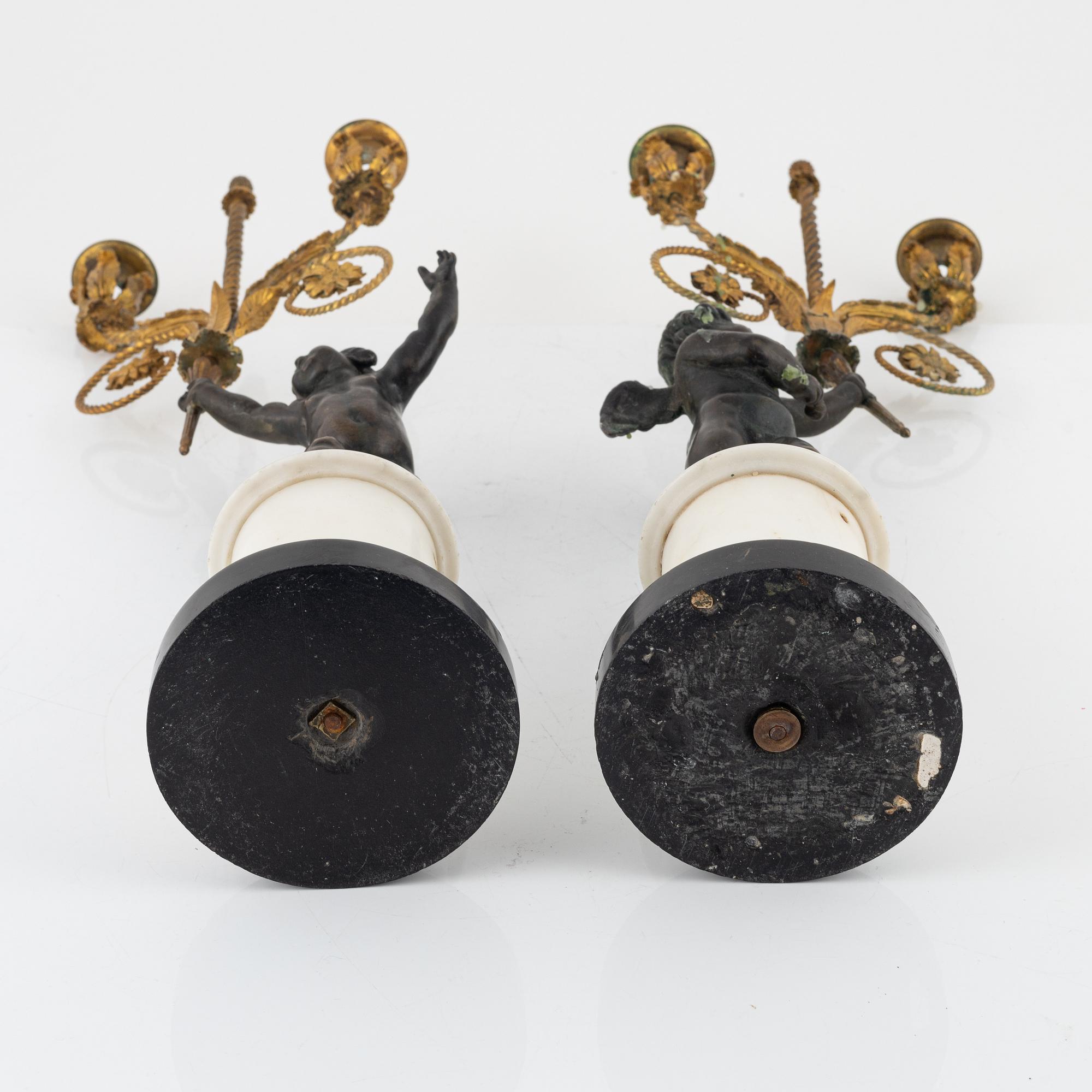A pair of Louis XVI style candelabra, 19th Century.