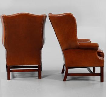 ÖRONLAPPSFÅTÖLJER, ett par, "Churchill Wing Chair", Claridge Upholstery, England, 2005.