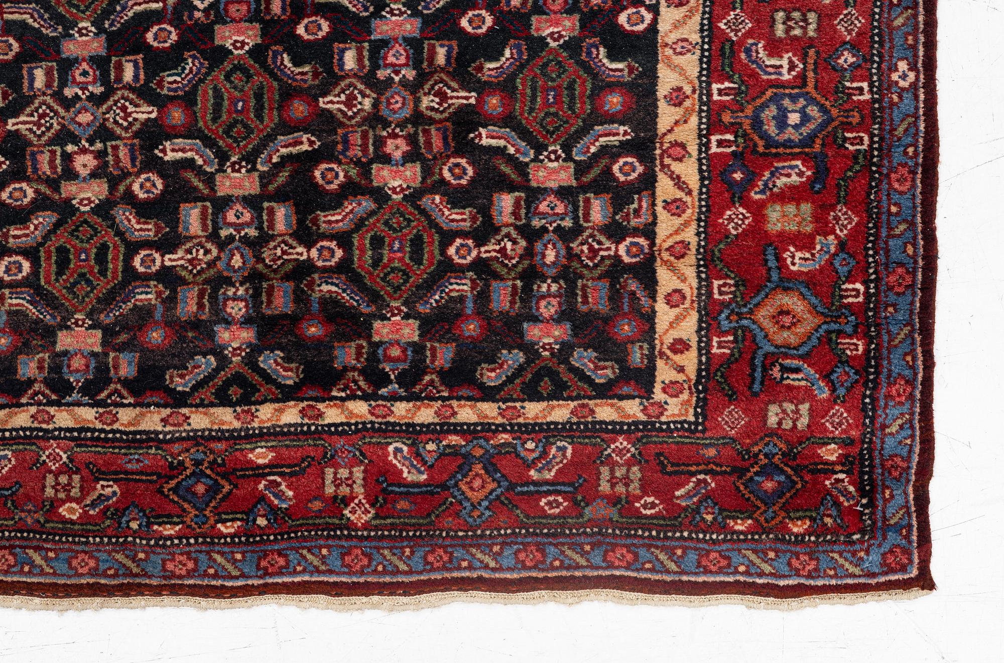 A semi-antique Bidjar rug, c. 255 x 135 cm.