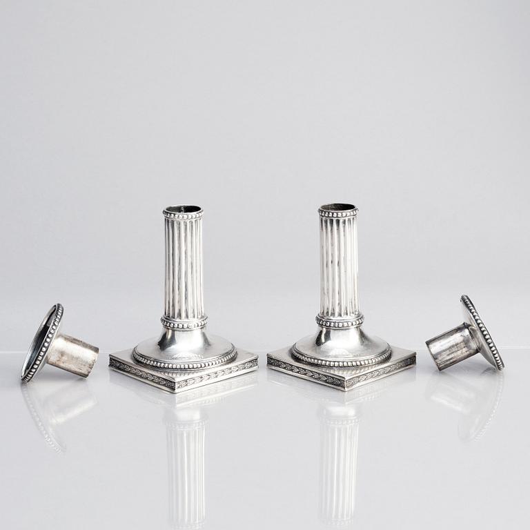 A Swedish pair of 18th century Gustavian silver candlesticks, marks of Johan Ekholm, Stockholm 1795.