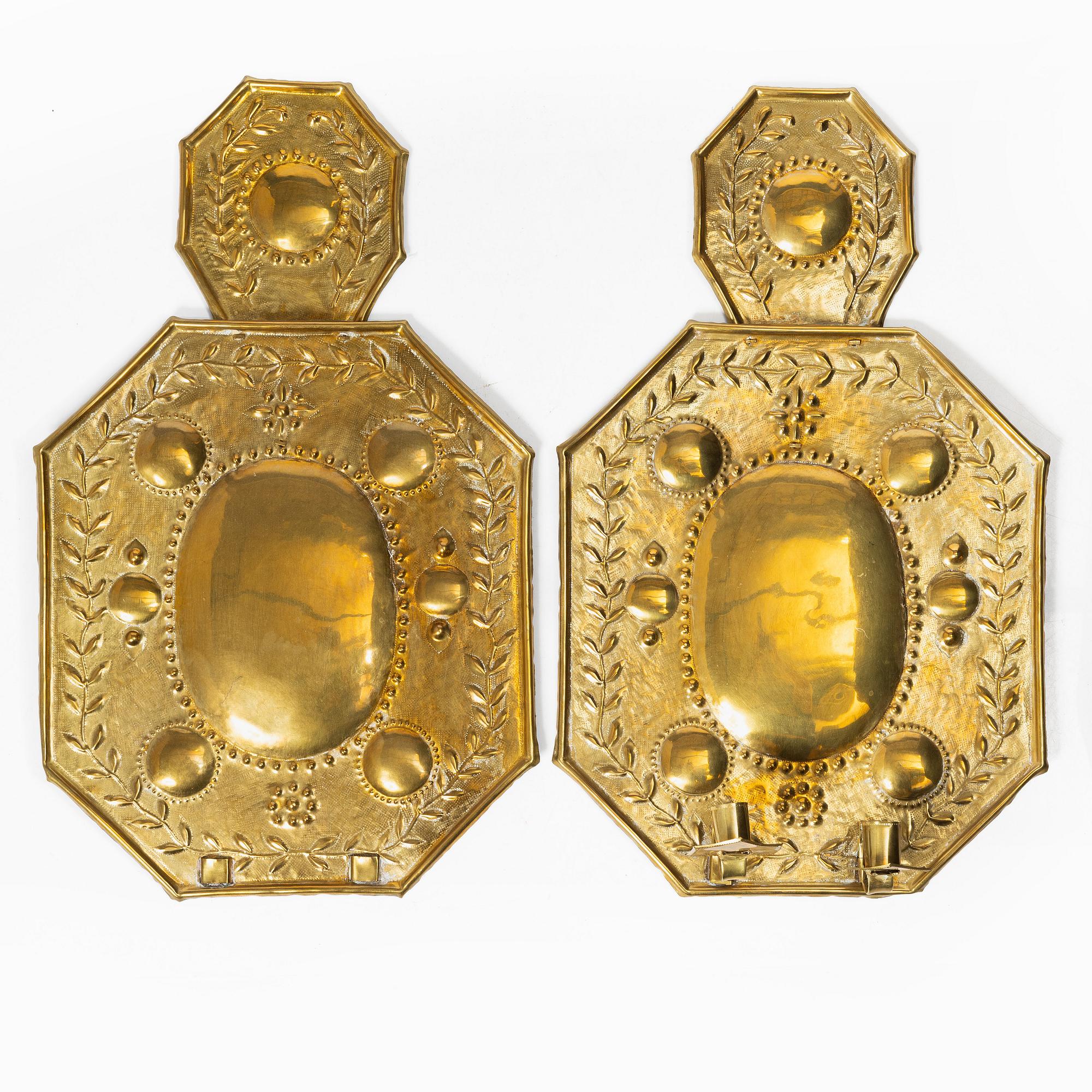 A pair of Barique-style brass wall sconces, early 20th century.