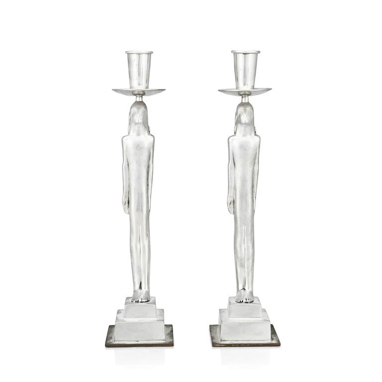 Edvin Öhrström, a pair of pewter and brass 'Egyptian' candlesticks, Svenskt Tenn, Sweden 1984.