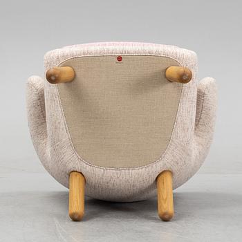 Finn Juhl, a 'Pelican' easy chair, onecollection House of Finn Juhl.