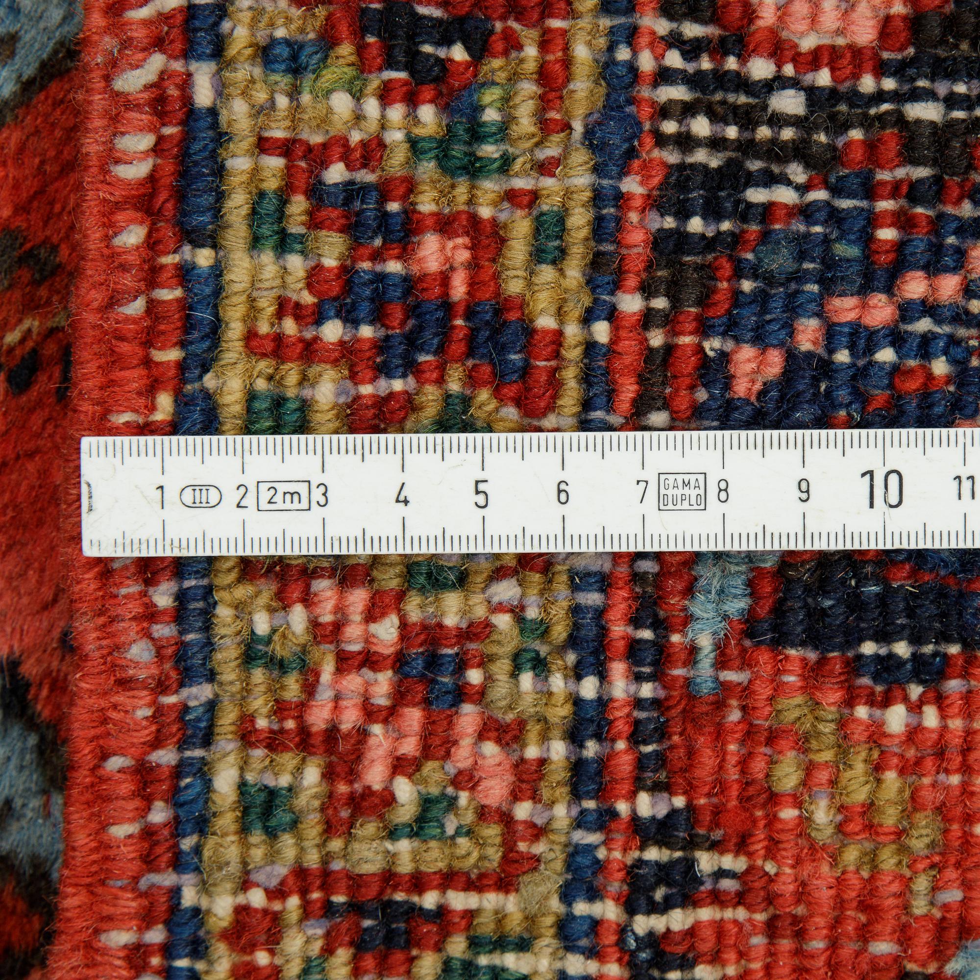 A runner, semi-antique North west persian, ca 362 x 105 cm.