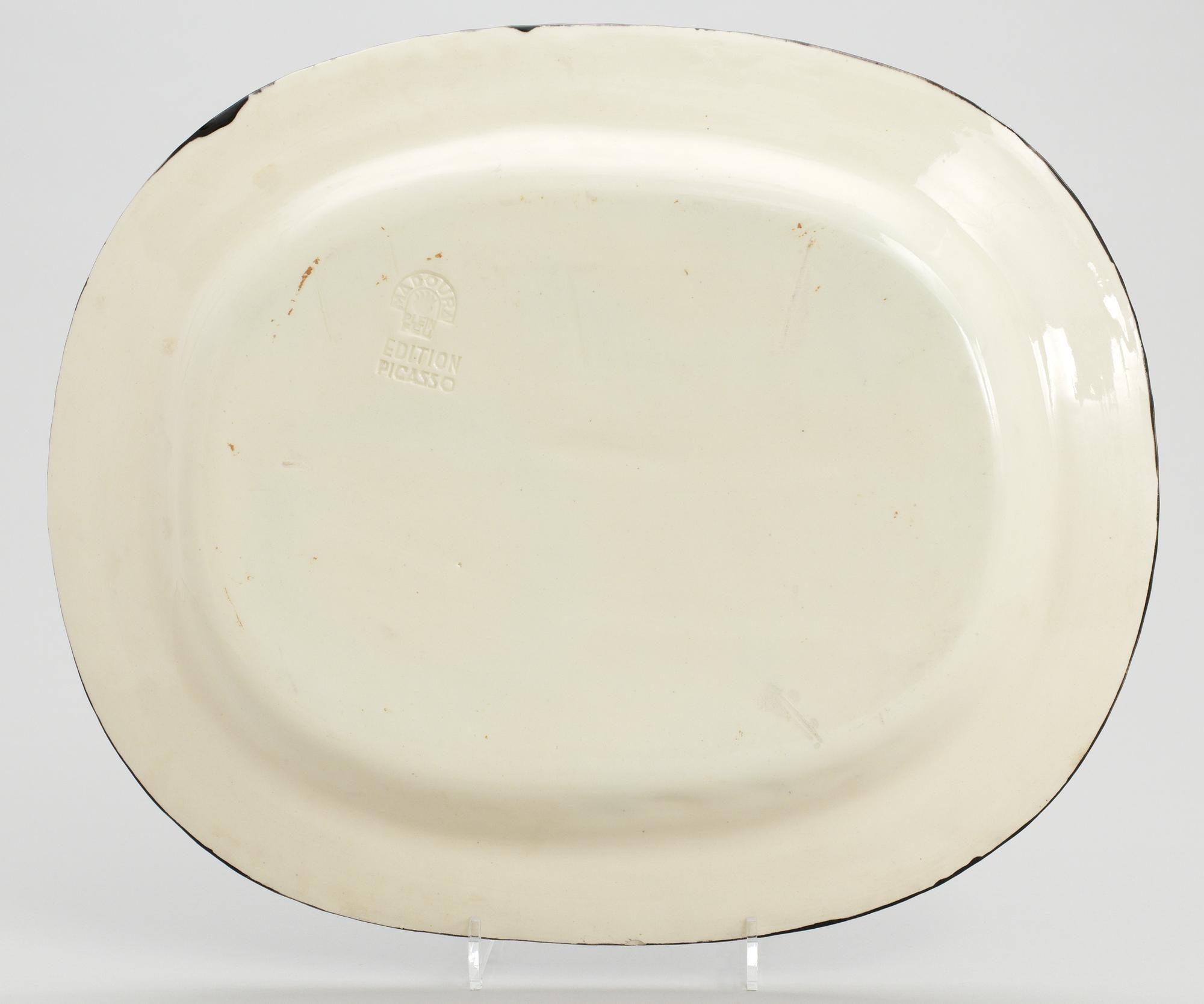 A Pablo Picasso 'Visage de femme' faience dish, Madoura, Vallauris, France 1953.