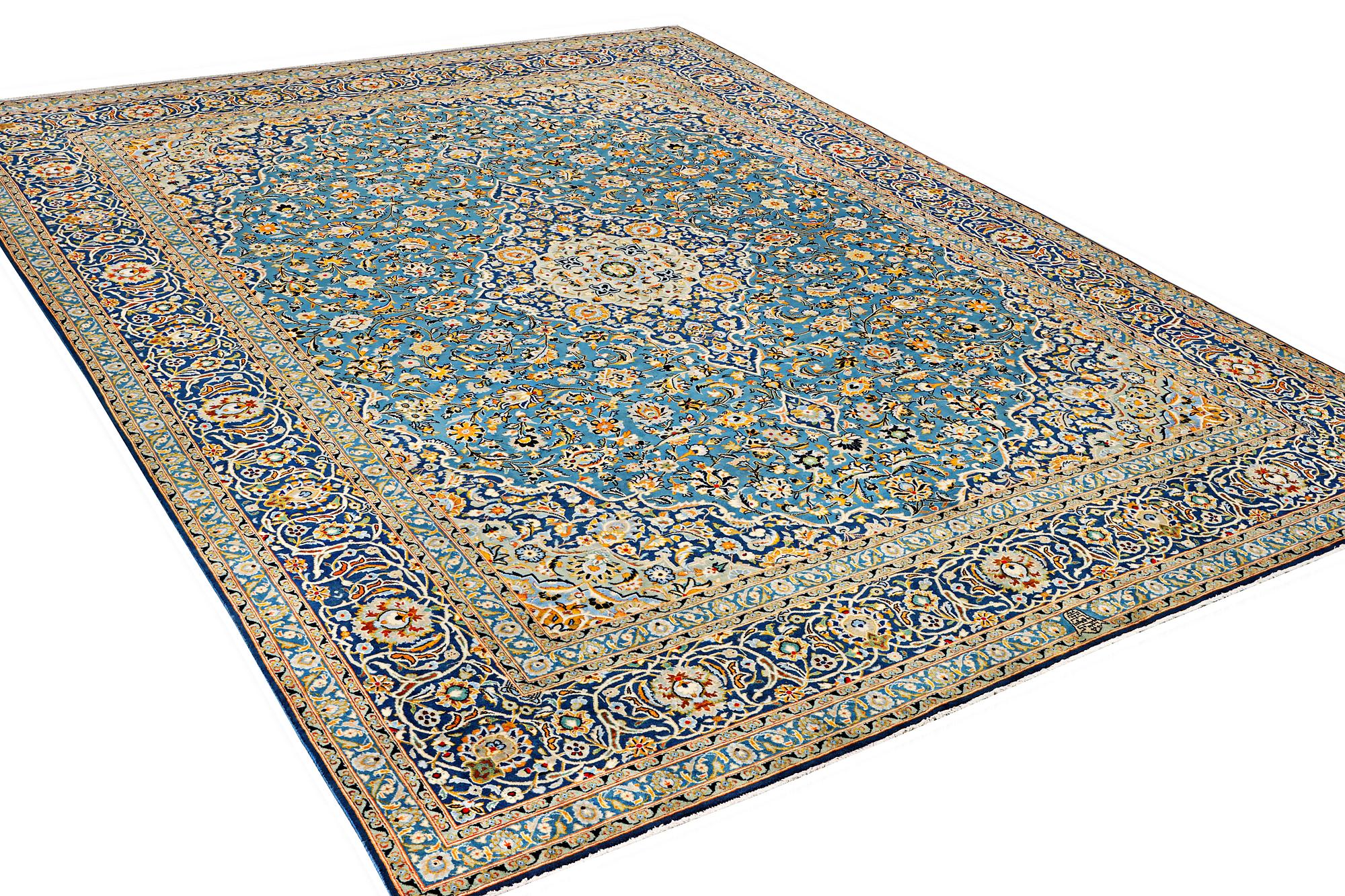 A Kashan carpet, signed Isfahanian, a. 407 x 310 cm.