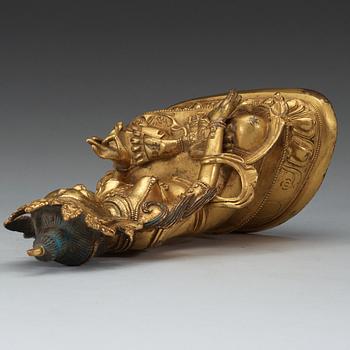 A Sinotibetan gilt bronze figure of Tara, Qing dynasty.
