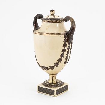 A creamware lidded urn, Late Gustavian, around 1800.