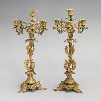 A pair of bronze candelabra from the latter half of the 19th Century.